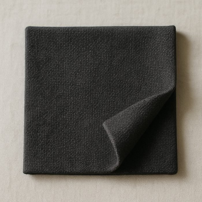 Close-up of heavy cotton canvas duck fabric showing its tight plain weave