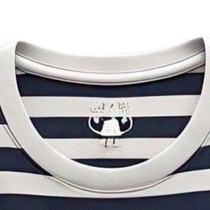Close-up of a ribbed crew collar joined to the body of a cotton t-shirt